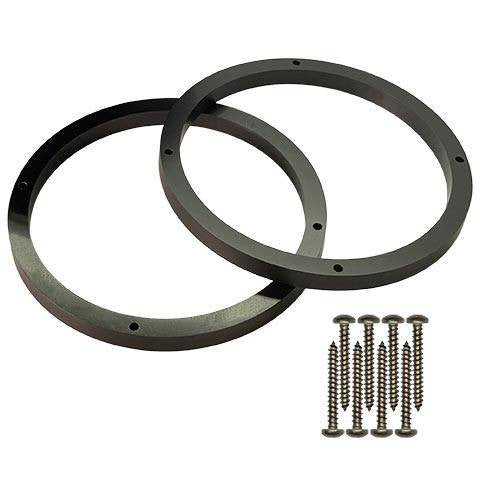 Two black HDPE speaker spacers with a bolt pattern and several screws placed next to them.