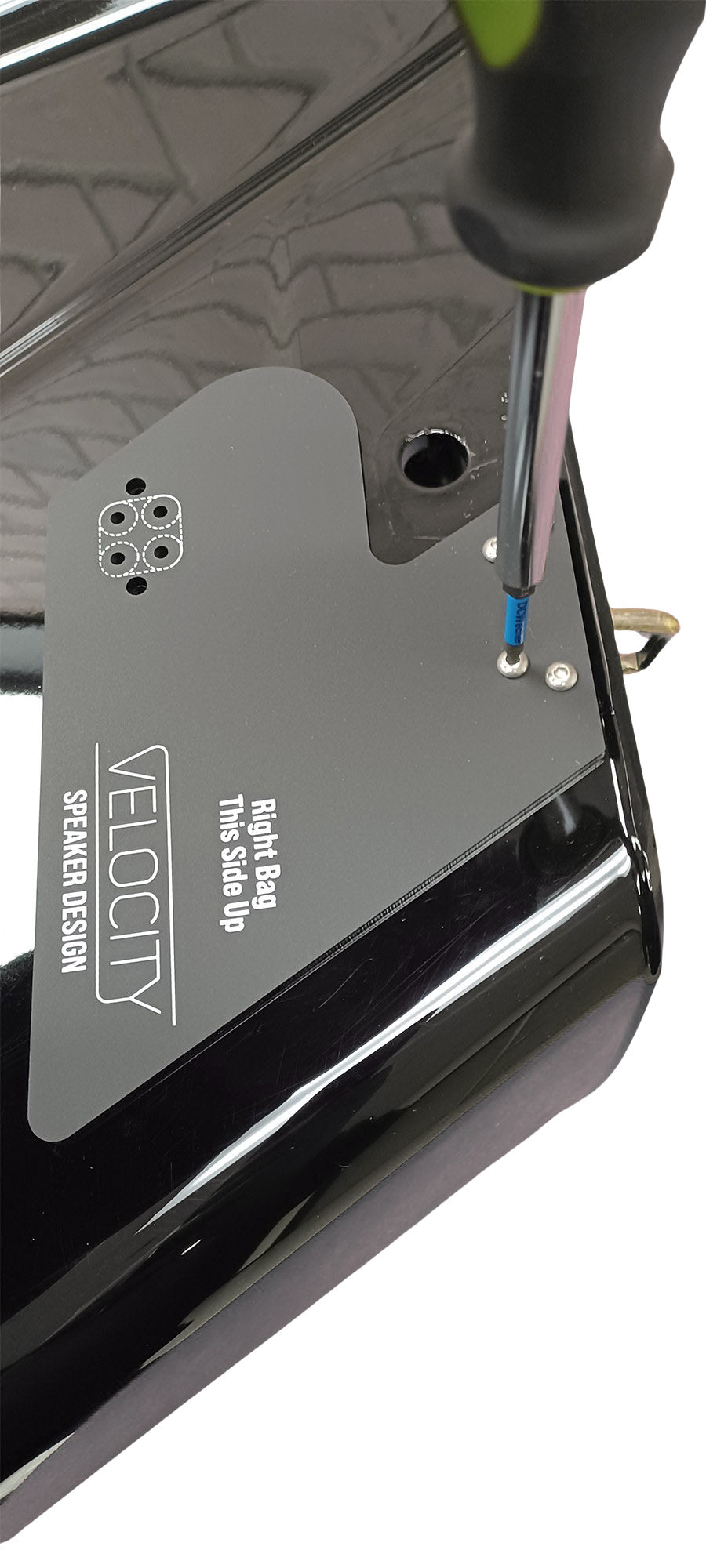 Template attached to the right bag using the factory latch bar screws