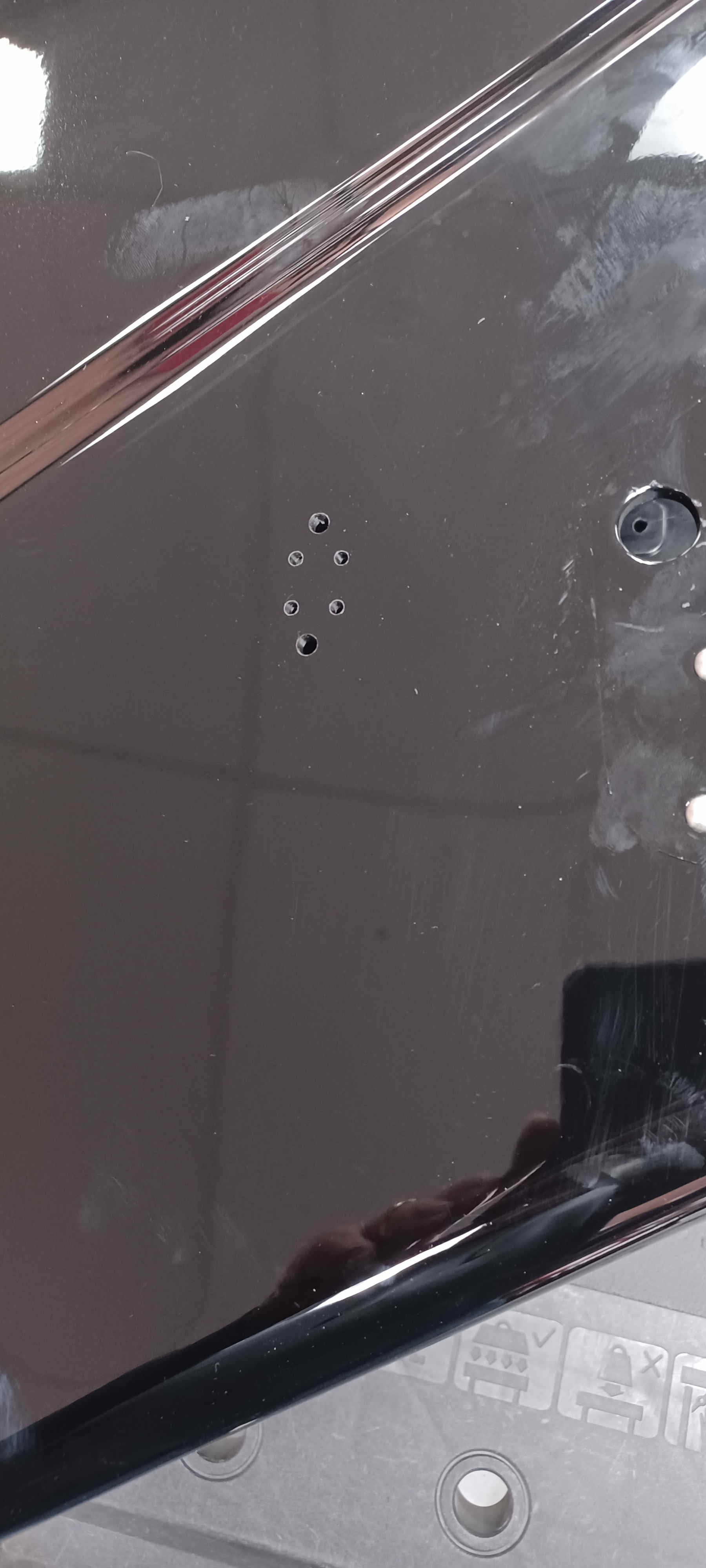 Template in place during pilot hole drilling