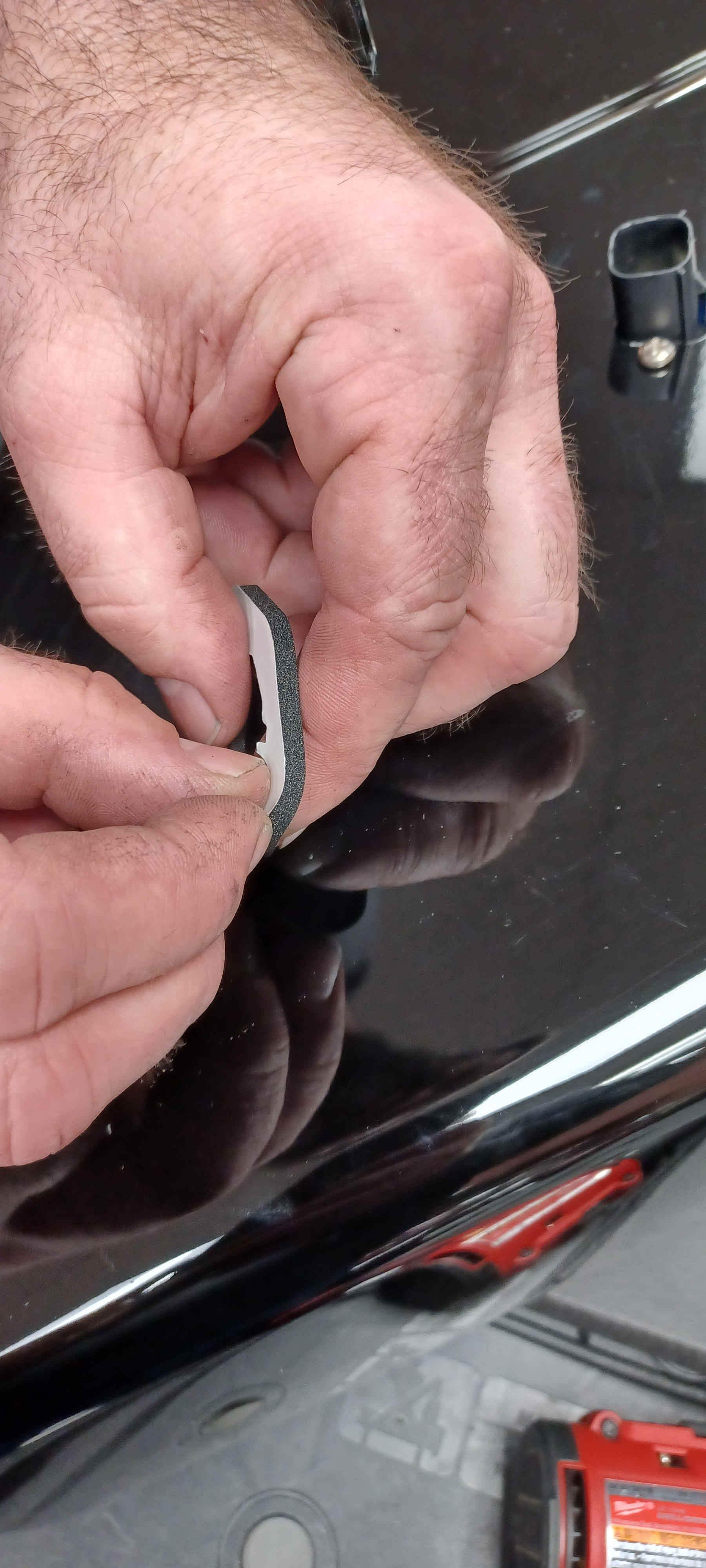 Applying the included foam seal around the bag-side plug
